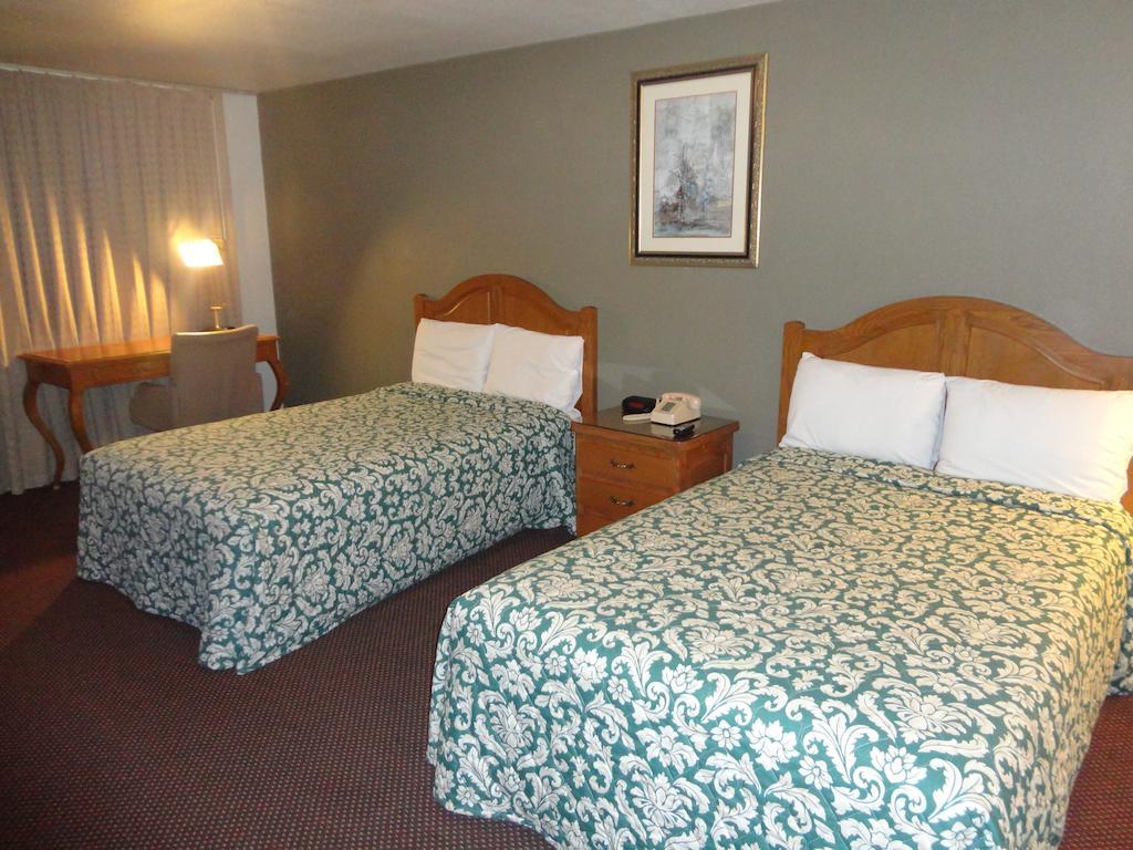 Garden Inn And Suites Silsbee الغرفة الصورة